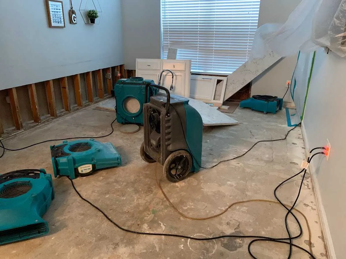 Dehumidifier in flood-cut room for Water Damage Restoration in Northfield
